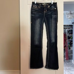 Big star, size 27L, low rise, boot cut jeans. Some wear at the bottom of pants